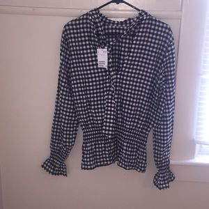 Checkered blouse . Never worn